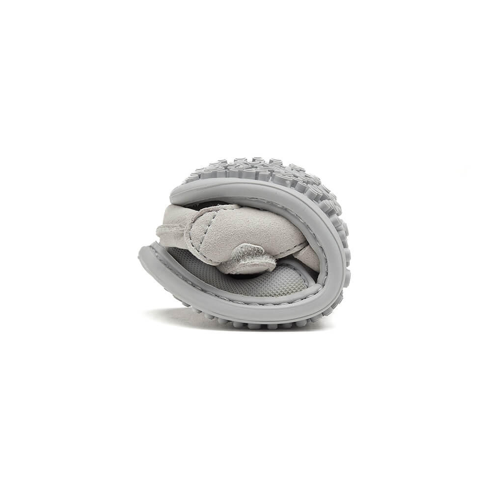 sandalias trenzadas suela blandita plana bebe color gris calpe feroz ss24