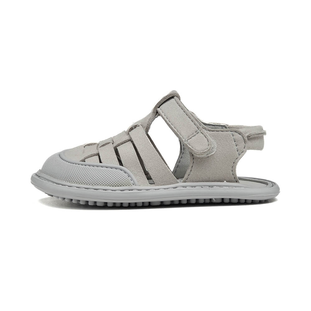 sandalias trenzadas suela blandita plana bebe color gris calpe feroz ss24  